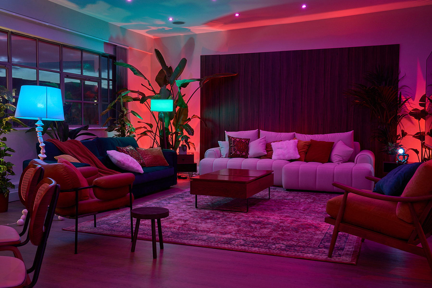 Warm-toned editorial lounge setup inside The Designer's Penthouse for premium brand campaign and content production